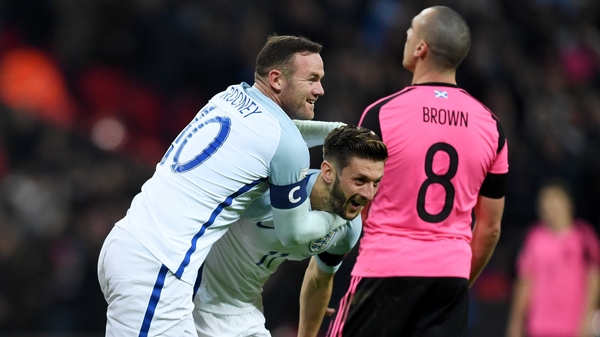 Wayne Rooney congratulates Adam Lallana after scoring England's second
