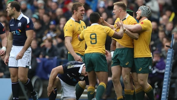 Reece Hodge celebrates his try against Scotland