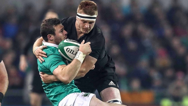 Robbie Henshaw is tackled by Sam Cane during Ireland's loss to New Zealand - the flanker was not guilty of any offence under the old laws