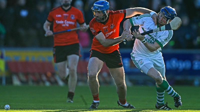 Oulart's Garrett Sinnott and Andy Kearns of O'Loughlin Gaels vie for possession at Wexford Park