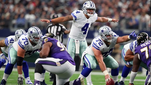 Dak Prescott calls a play