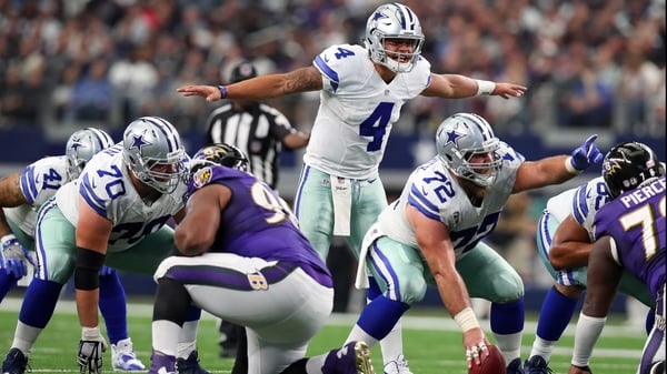 Dak Prescott calls a play