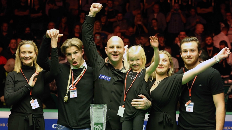 Mark King celebrates with his family
