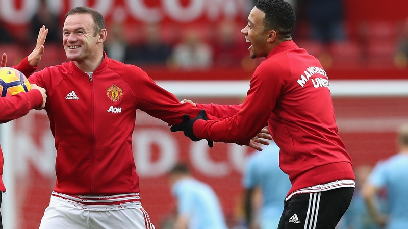 Wayne Rooney and Memphis Depay (but does he own a Chevrolet?)