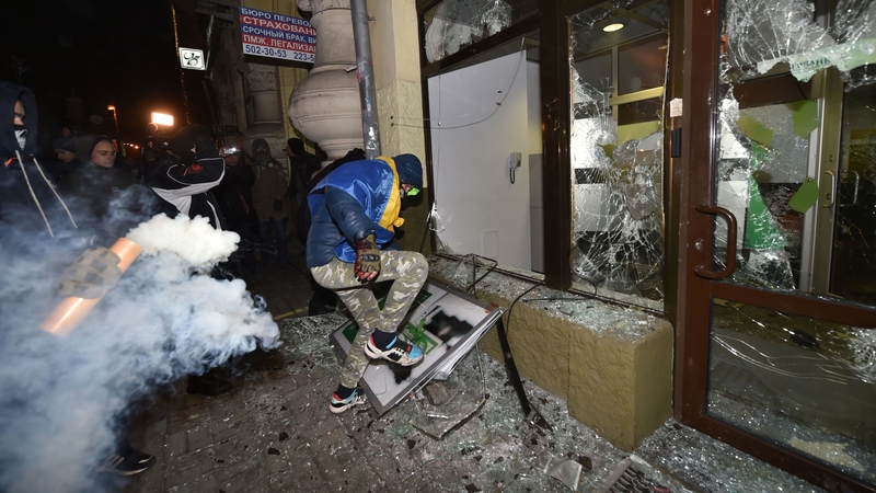 Activists of some far-right Ukrainian parties break into a branch of Russian Sberbank in the centre of Kiev