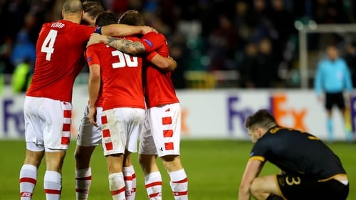 AZ Alkmaar players celebrate at the full-time whistle