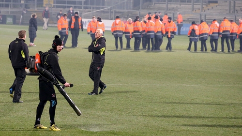 Ground staff worked in vain to defrost the pitch