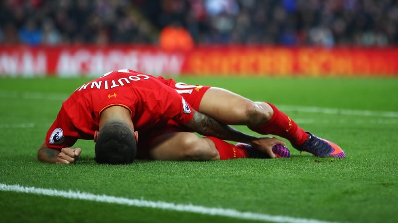 Coutinho writhes in agony after injuring his ankle
