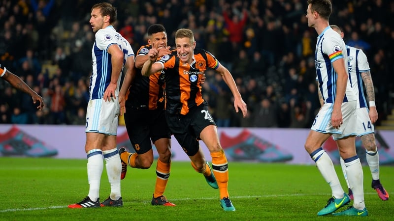 Michael Dawson celebrates Hull City's equaliser