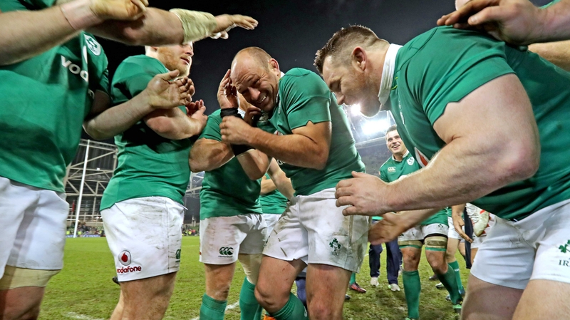 The Irish players celebrate with captain Rory Best