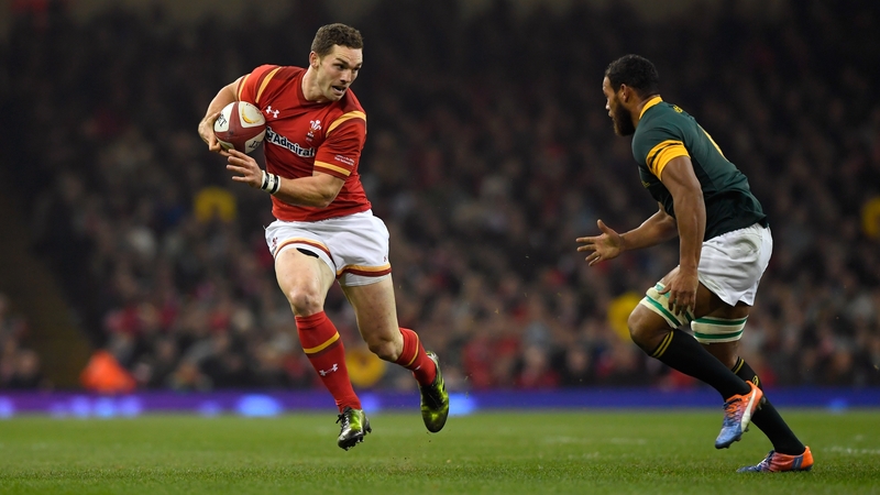 George North of Wales takes on Nizaam Carr