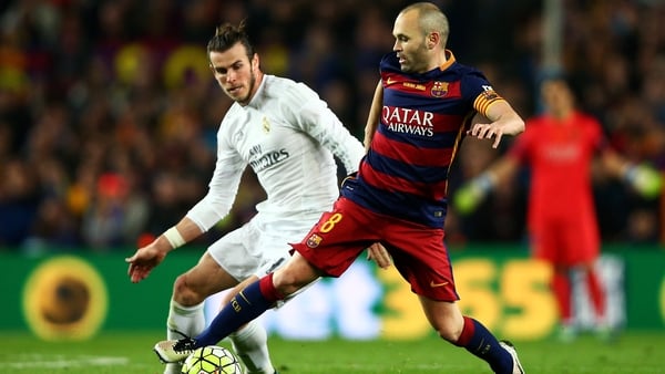 Iniesta shields possession in last season's Clasico at the Nou Camp