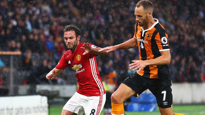 David Meyler takes on Juan Mata