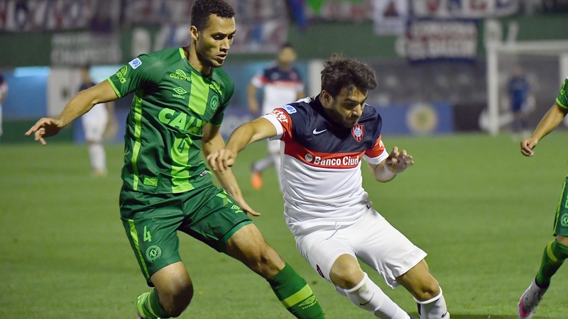 Chapecoense's Neto, left, has vowed to return to football following leg surgery