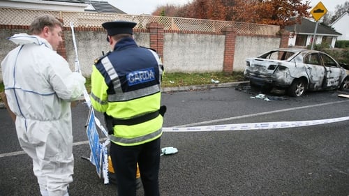 A burned out car was found close to the scene of the shooting in Lucan