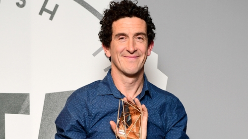 Robbie Ryan with his award
