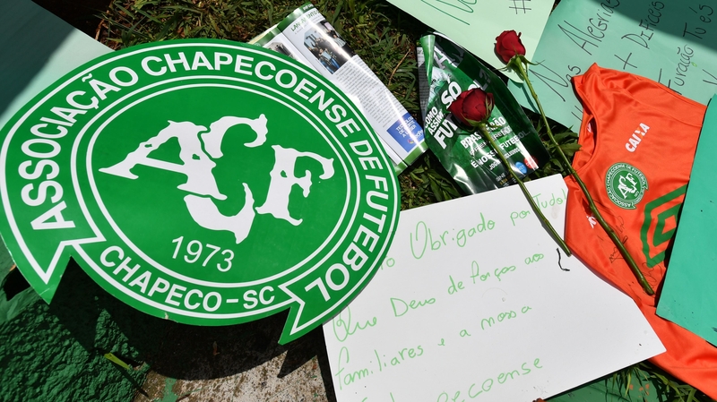 People pay tribute to the players of Chapecoense at the club's stadium in Chapeco