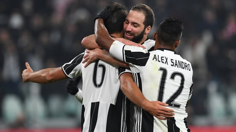 Gonzalo Higuain helped Juventus finish top of Group H