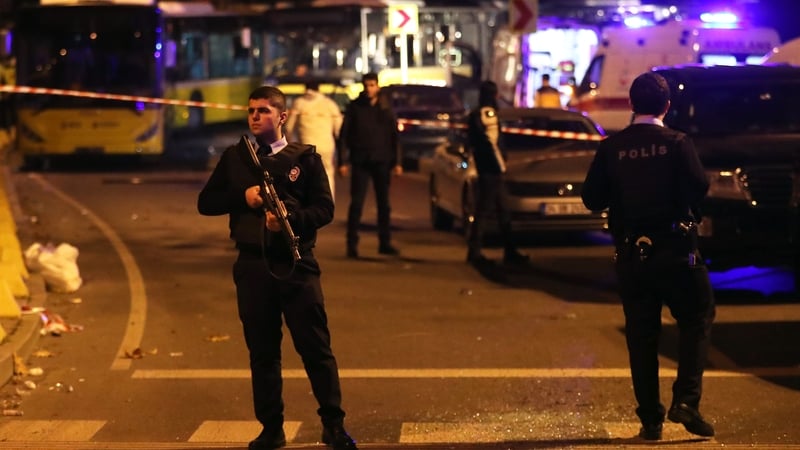 Police secure the area after an explosion at a football stadium in Istanbul