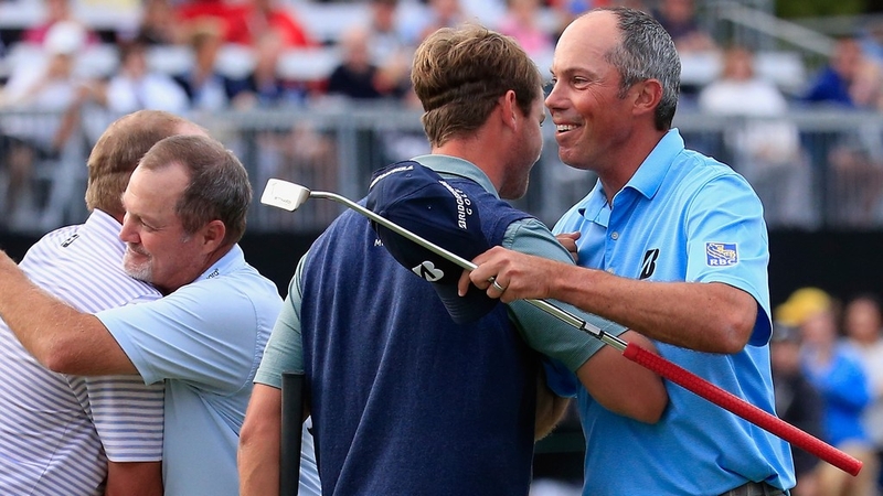 Harris English (R) congratulates his team-mate Matt Kuchar