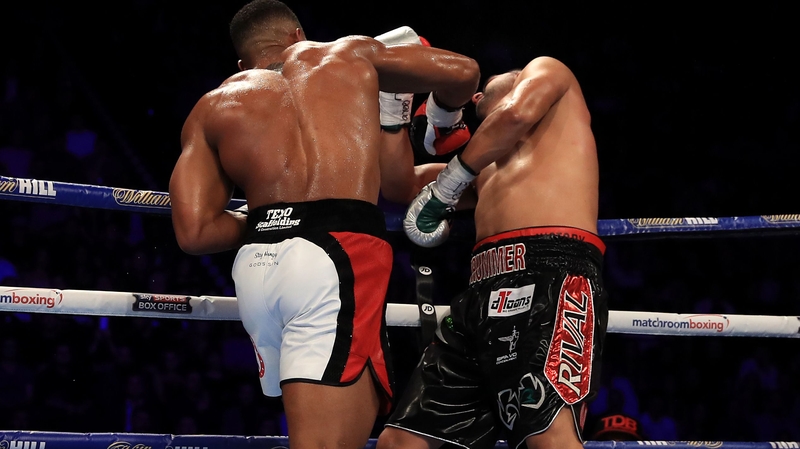 Joshua (l) won by technical knockout