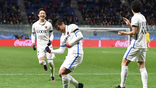 Yasushi Endo celebrates scoring a nonchalant back-heel for Kashima Antlers