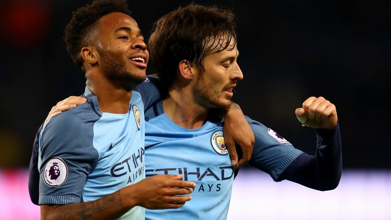 Raheem Sterling (L) celebrates with David Silva