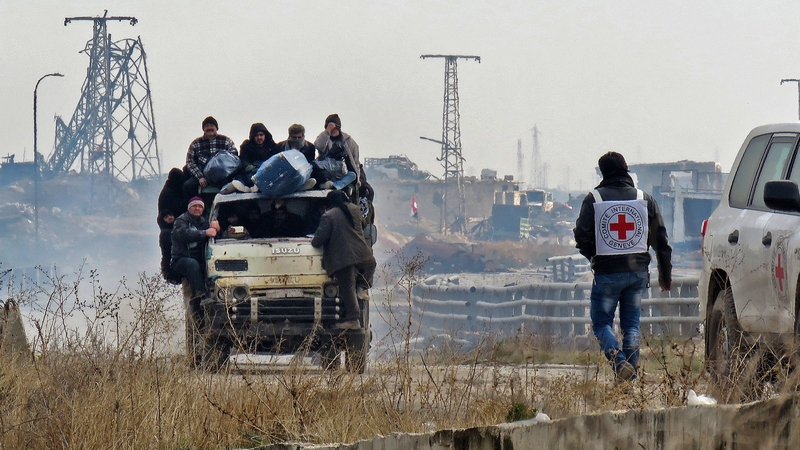 Syrians leave the long-besieged city of Aleppo
