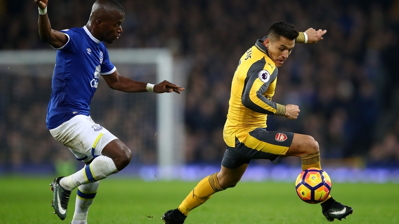 Alexis Sanchez (R) has scored 14 goals this season