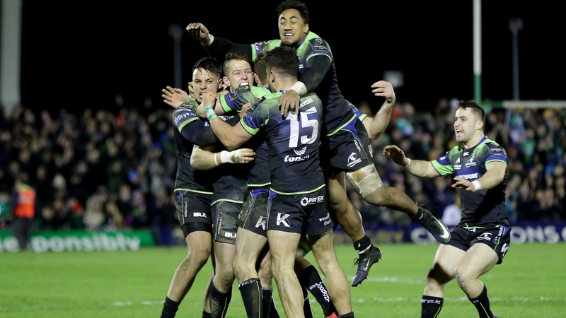 Connacht players celebrate with winning goal kicker Jack Carty