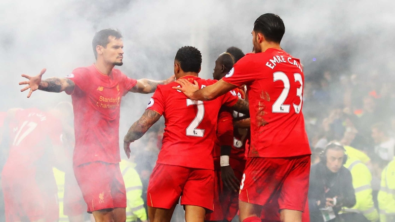 Liverpool players celebrate Sadio Mane's late winner