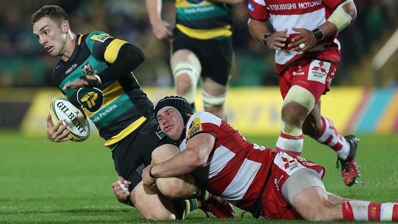 George North (L) passed a head injury assessment during the game against Leicester