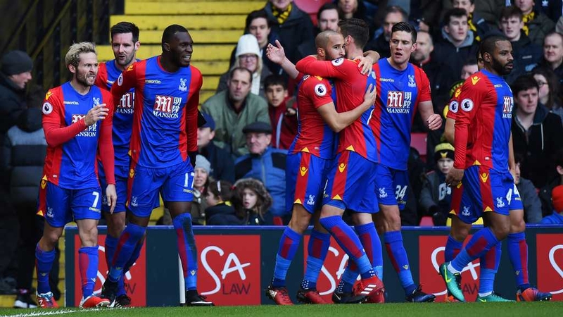 Yohan Cabaye celebrates with his Crystal Palace team-mates after scoring the opener against Watford
