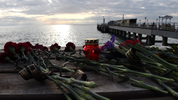 Flowers are left at the coast in Sochi