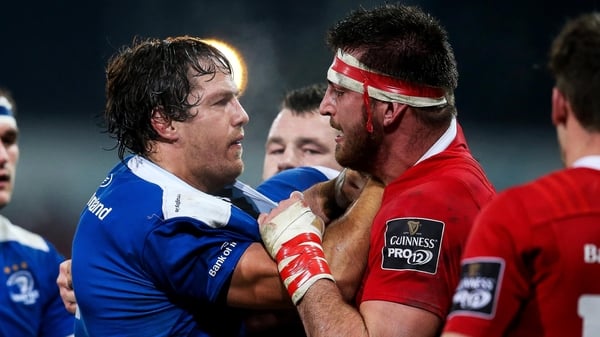 Munster's Jean Kleyn gets in a tussle with Mike McCarthy of Leinster