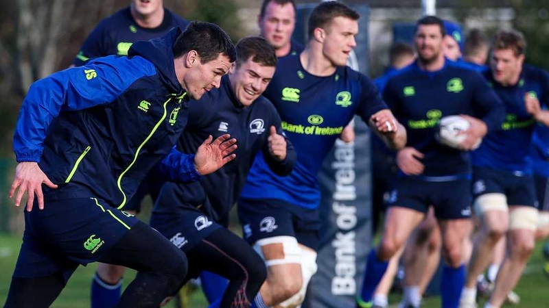 Jonny Sexton (L) goes through his paces