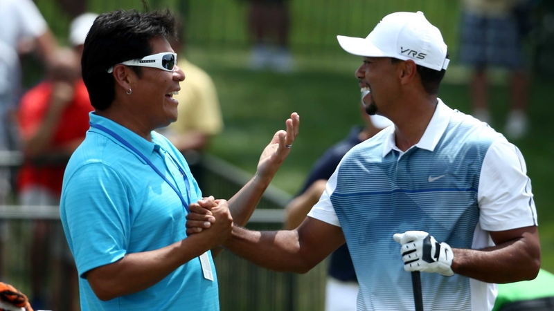Notah Begay III and Tiger Woods during the 96th PGA Championship in 2014