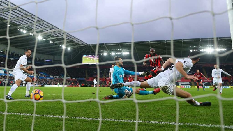 Benik Afobe opens the scoring for Bournemouth against rock-bottom Swansea