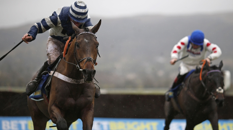 Davy Russell and Whisper (L) clear the last to win