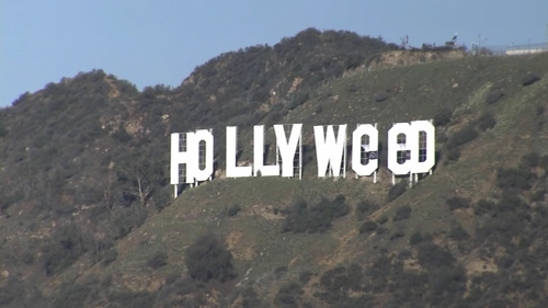 Residents awoke today to find 'Hollyweed' staring down at them in four-storey, white letters from Los Angeles' Mount Lee