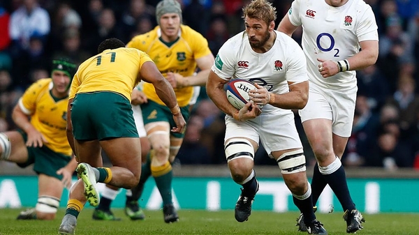 Chris Robshaw is tackled by Australia's Sefanaia Naivalu