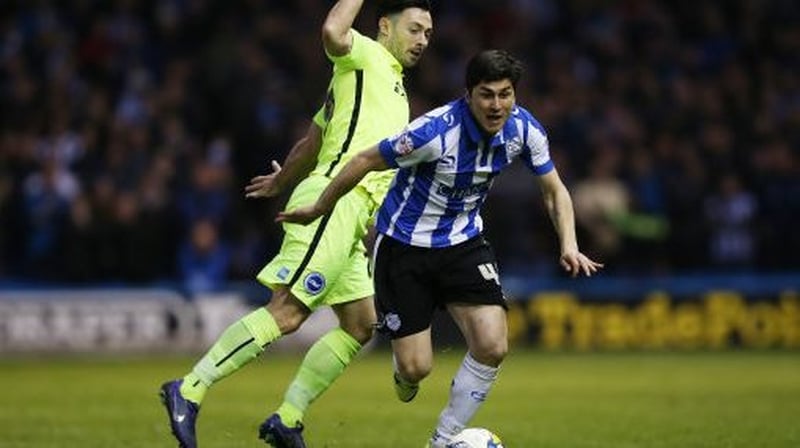 Richie Towell (L) in action in last season's play-off semi-final against Sheffield Wednesday, his only league appearance to date