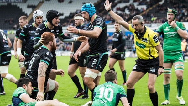Dan Baker celebrates for Ospreys after scoring their first try