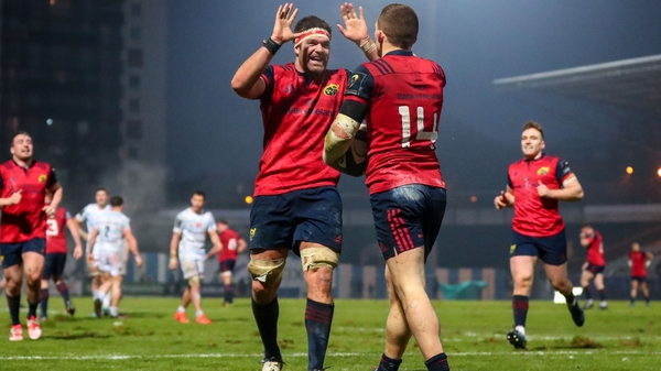 Billy Holland congratulates Andrew Conway following his late first-half try
