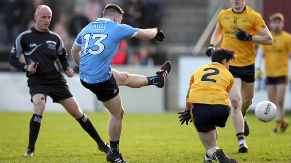Dublin's Paul Hudson fires past Eoin Smith