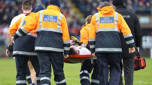 Connor McAliskey of Tyrone is taken off the pitch