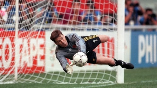 Packie Bonner palms away Daniel Timofte's penalty in Genoa