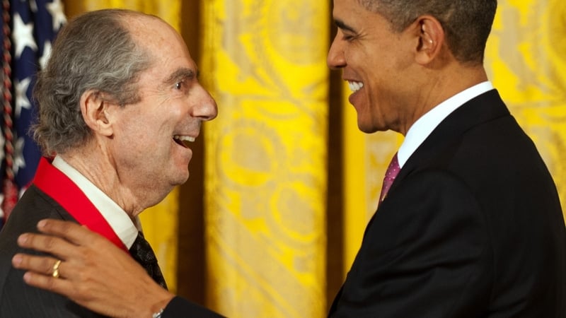 US President Barack Obama presents the National Humanities Medal to Novelist Philip Roth during a ceremony at the White House in Washington, DC, March 2, 2011.