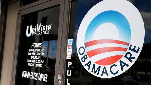 An Obamacare logo on the door of the UniVista Insurance agency in Miami, Florida
