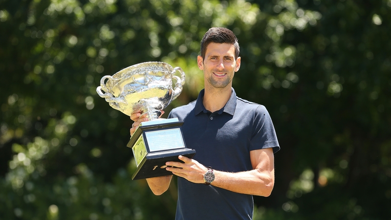 Novak Djokovic with the Australian Open trophy